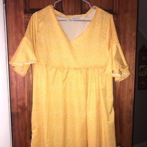 Yellow knee length dress